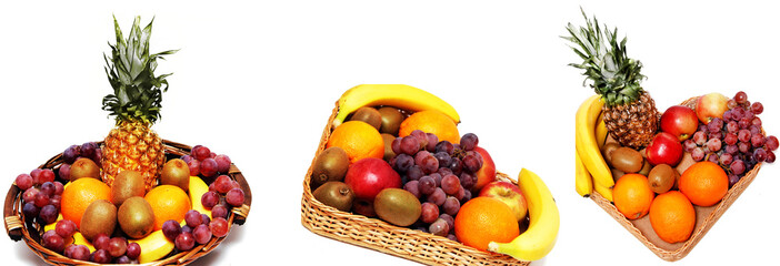 Basket with tropical fruits isolated on white background.
