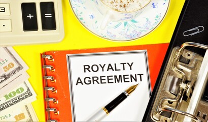 Royalty agreement. Text label on the planning folder. License fee, monetary compensation, for the...