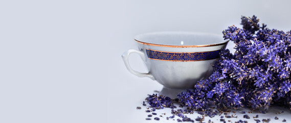 Obraz na płótnie Canvas composition with lavender and a cup