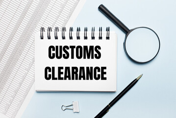 On a light blue background, reports, a magnifying glass, a pen and a notebook with the text CUSTOMS...