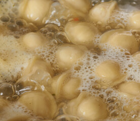 Fototapeta na wymiar delicious dumplings are boiled in boiling water