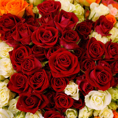 Bunch of red roses on a blurred background, flowershop