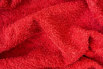 Undulating red plush bath towel fabric