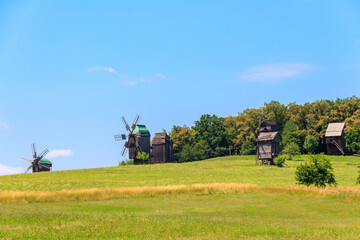 Fototapeta na wymiar Old wooden windmills in Pyrohiv (Pirogovo) village near Kiev, Ukraine