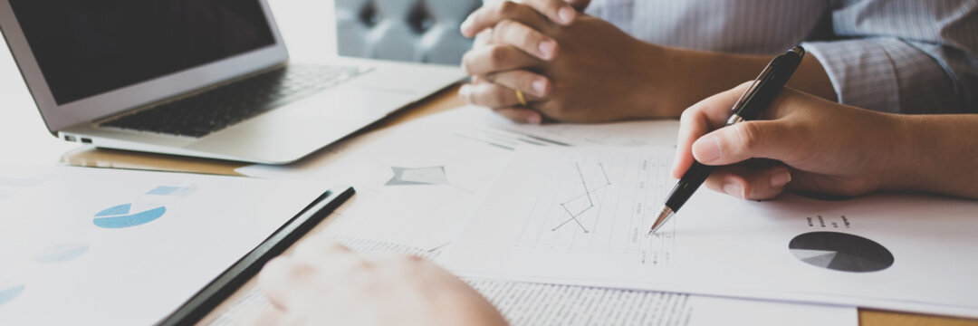 Investor calculating profits on stock market exchange.Investment planing and strategy concept, Financial data analysis graph business