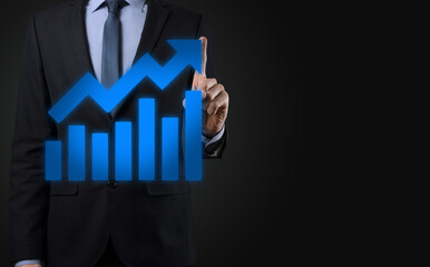 Businessman hold drawing on screen growing graph, arrow of positive growth icon.pointing at creative business chart with upward arrows.Financial, business growth concept