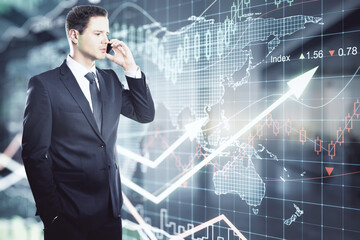 Forex market and investing concept with talking by phone businessman on digital wall background with market exchange graphs and candlestick