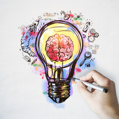 Idea and startup cocnept with hand writing sketch with human brain, rocket, battery and...