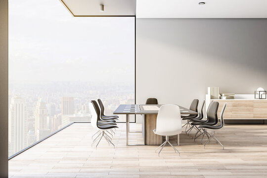 Eco style conference room with city view from glass wall, wooden floor and monochrome style table and chairs around