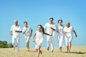 portrait of happy family on beach