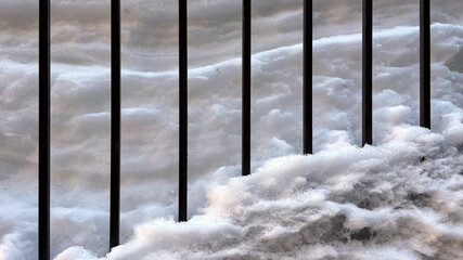 ice on the window, abstract wall of snow