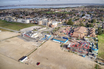 Fototapeta na wymiar Beautiful Hayling Island Hampshire South Beach aerial with the Amusement Park and the popular holiday destination in Southern England Aerial Photo.