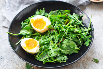 fresh salad egg lettuce leaves mix arugula, chard healthy meal copy space food background. top view diet vegan or vegetarian food