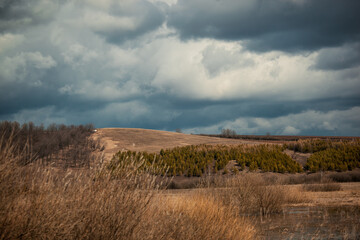 storm clouds and clouds over the fields, changes in the weather