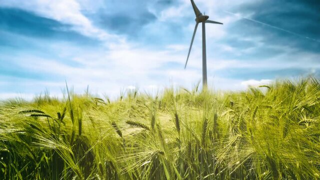 Country landscape with wind turbine, slow motion 4K