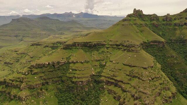 Mountainous rocky slopes of Umgeni Valley Nature Reserve in KwaZulu-Natal, South Africa - Aerial fly-over shot