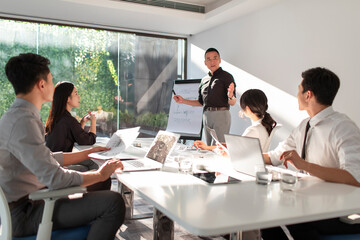 Business people having meeting in board room