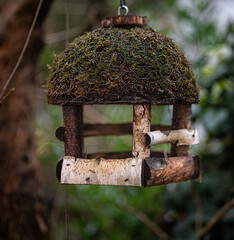 Wooden house for birds in the garden