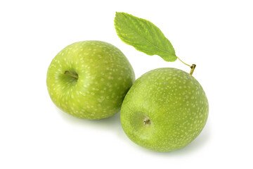 Two green apples with leaf isolated on white