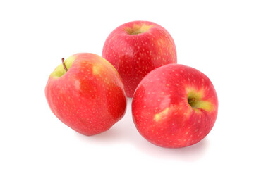 Three ripe red apples isolated on white