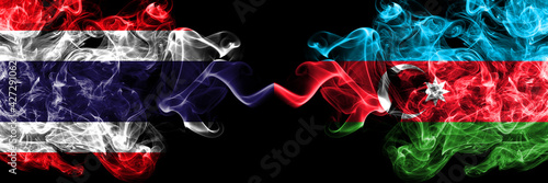 Thailand, Thai vs Azerbaijan, Azerbaijani smoky mystic flags placed side by side. Thick colored silky abstract smokes flags.