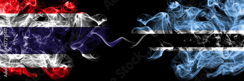 Thailand, Thai vs Botswana, Batswana smoky mystic flags placed side by side. Thick colored silky abstract smokes flags.