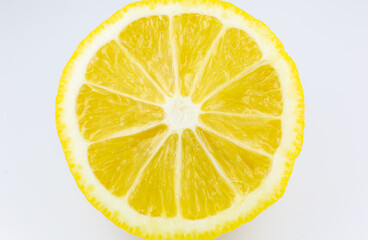 Close up photo of lemon texture background. Fruit cut in half, inside, macro view.