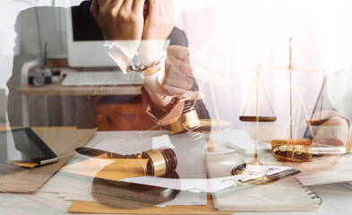 justice and law concept.Male judge in a courtroom on wooden table and Counselor or Male lawyer working in office. Legal law, advice and justice concept.