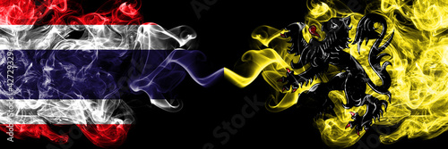 Thailand, Thai vs Flanders, Flemish smoky mystic flags placed side by side. Thick colored silky abstract smokes flags.