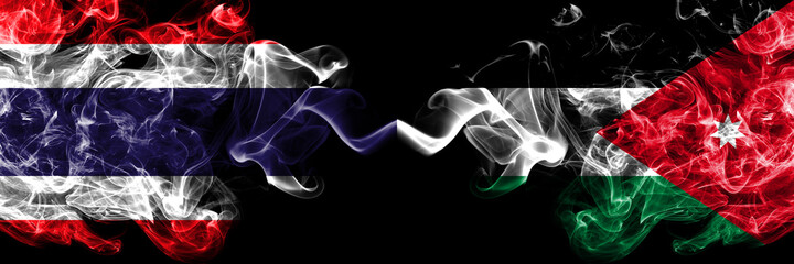 Thailand, Thai vs Jordan, Jordanian smoky mystic flags placed side by side. Thick colored silky abstract smokes flags.