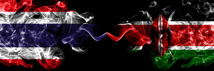 Thailand, Thai vs Kenya, Kenyan smoky mystic flags placed side by side. Thick colored silky abstract smokes flags.