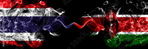 Thailand, Thai vs Kenya, Kenyan smoky mystic flags placed side by side. Thick colored silky abstract smokes flags.
