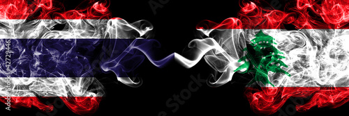 Thailand, Thai vs Lebanon, Lebanese smoky mystic flags placed side by side. Thick colored silky abstract smokes flags.