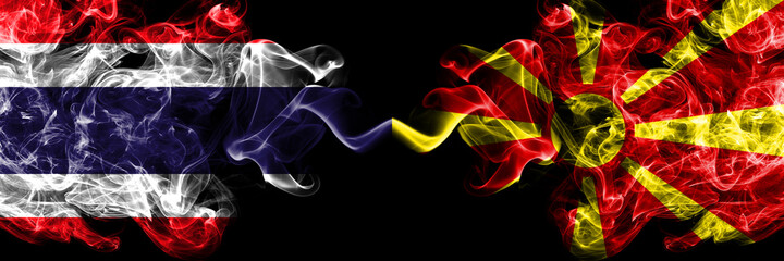 Thailand, Thai vs Macedonia, Macedonian smoky mystic flags placed side by side. Thick colored silky abstract smokes flags.