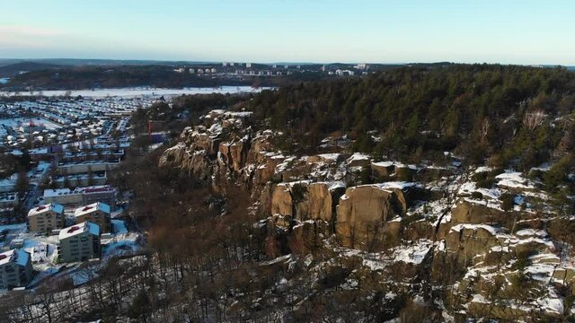 Aerial - Mountains in Utby, suburb of Gothenburg, Sweden, wide spinning shot