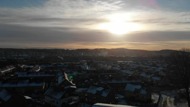 Aerial - Sunrise in Utby, suburb of Gothenburg, Sweden, wide rising shot