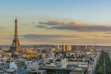 Paris view from the top of Arc de Triomphe de l'Etoile on sunset. Eiffel Tower on the background. France.