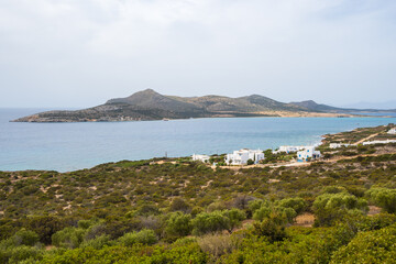 Beautiful coast of Antiparos with a view of Despotiko island in background. Cyclades, Greece