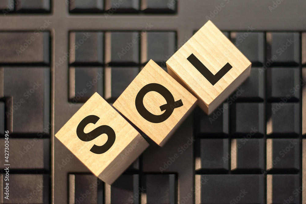 Poster sql - structured query language - letter pices on the wooden blocks