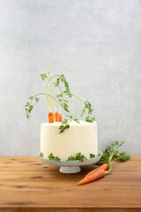 Old fashioned spiced moist carrot cake with cream cheese frosting