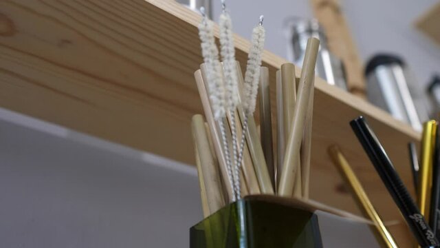 No plastic whatsoever. Conscious minimalist vegan lifestyle. Reduced reuse. Butterfly straw for drinks.