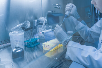 Asian scientist working in the lab at safety zone,The researchers analyzed to find the results of the experiment,Developers of potential medicines and vaccines against COVID-19