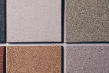 Lehmputztechnik, Spachteltechnik auf Musterplatten.