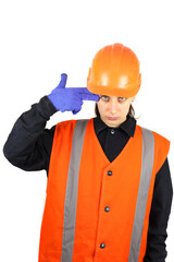 female builder or engineer shows a gesture to shoot yourself. Isolated on white