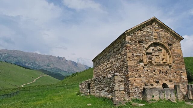 Panorama view of Tkhaba Yerdy medieval temple in Ingushetia, Russia, Northern Caucasus, 4k