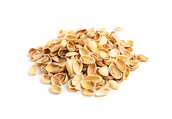 Pile of pistachios husks isolated on white background