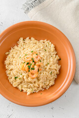 Portion of risotto with prawn