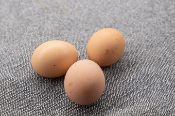 eggs on grey textil background