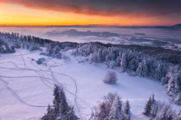 Winter morning in Gorce on the tower on the top of Lubań. A beautiful, romantic atmosphere with a view of the Pieniny Mountains, the Beskids and the Tatra Mountains.
