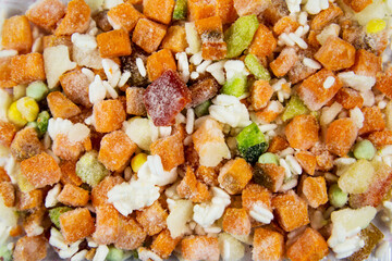 Hawaiian vegetable mixture quick-frozen consisting of rice, corn, bell pepper, green peas, useful products vitamins.